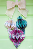 Decorate your door with this beautiful DIY giant paper ornament Christmas wreath. Fun and easy to make! | Housefulofhandmade.com