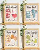 Four fall farm signs in frames.