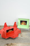 Two gift card boxes opened up to show gift cards inside.