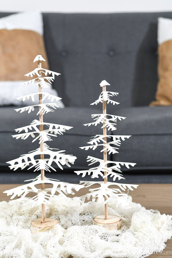 Close-up of the unique Christmas tree branch design on the paper Christmas trees.