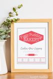 Figgy Pudding Bakery printable Christmas sign in a frame.