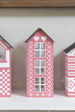 Close up of the tall skinny house in the Scandinavian Christmas Village.